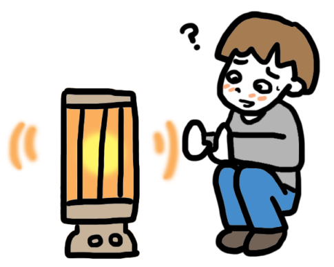 ストーブにあたって体調が変化している男子